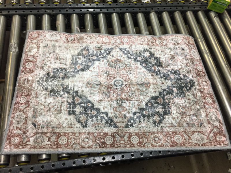 Photo 1 of 23"x36" area rug **SLIGHTLY DIRTY**