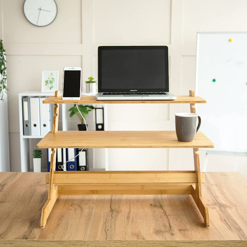 Photo 1 of Crew & Axel Standing Desk Converter Bamboo Adjustable Sit Stand Desk Riser - Great for Laptops, Monitors Home or Office 19" High 26" Wide with Tablet & Phone Stand
