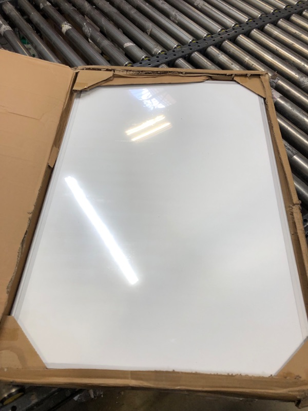 Photo 2 of Amazon Basics Magnetic Dry Erase White Board, 36 x 24-Inch Whiteboard - Silver Aluminum Frame 24" x 36" Magnetic, Aluminum Frame---------Lightly Used