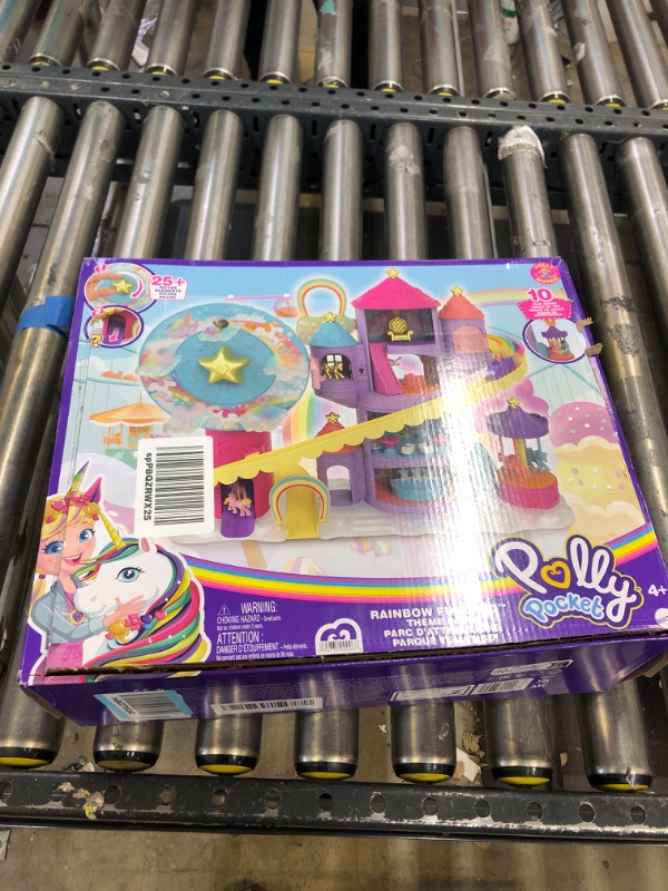 Photo 3 of ?Polly Pocket Rainbow Funland Theme Park, 3 Rides, 7 Play Areas, Polly and Shani Dolls, 2 Unicorns & 25 Surprise Accessories (30 Total Play Pieces), Dispensing Feature for Surprises---------lightly used