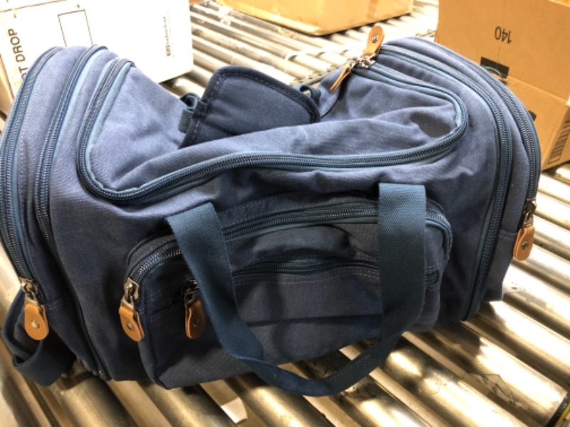 Photo 1 of blue duffle bag--soft denim material--BLUE / BROWN