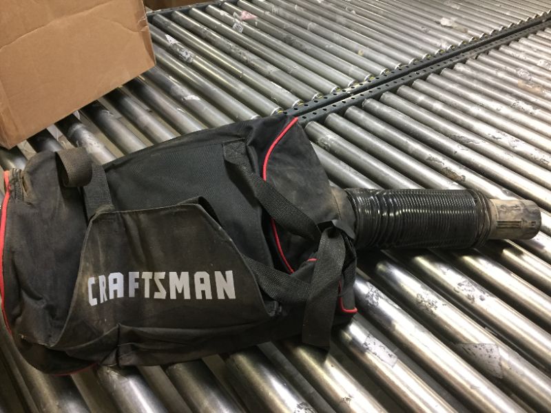 Photo 2 of CRAFTSMAN Leaf Blower / Leaf Vacuum & Mulcher, 12-Amp, Corded (CMEBL7000) New Blower/Vac  *** ITEM HAS DEBRIS AND MARKS FROM PRIOR USE ***