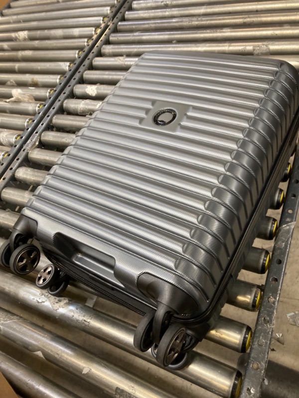 Photo 1 of DIRTY FROM PREVIOUS USE, NO KEY, 21 Inch Graphite, DELSEY Paris Cruise 3.0 Hardside Expandable Luggage with Spinner Wheels, Graphite, Carry on 21 Inch Carry