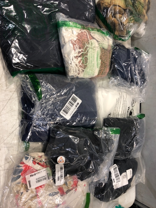 Photo 1 of Assorted Clothes Sold As Is Bags Unopened