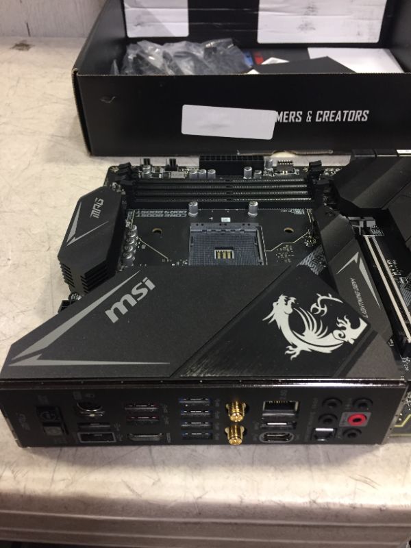 Photo 3 of MSI MPG X570S Edge MAX WiFi Gaming Motherboard (ATX, AMD, Socket AM4. DDR4, PCIe 4, CFX, M.2 Slots, Wi-Fi 6E) --unable to test--
