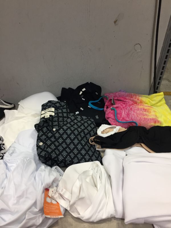 Photo 2 of bag lot of men and women clothes different styles and sizes ---sold as is --