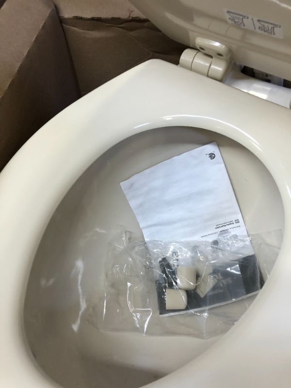 Photo 2 of Dometic 302310033 310 Series Standard Height Toilet 19.75" Height, Slow Close Wood Seat, Bone Bone Standard Height Toilet