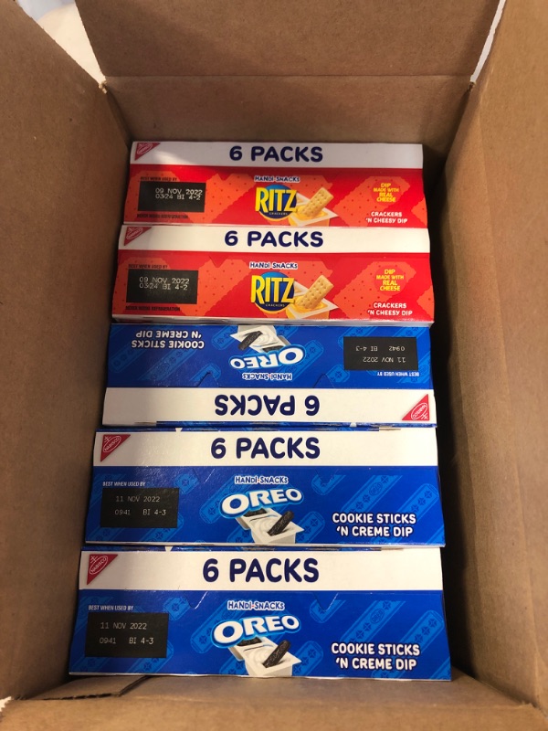Photo 1 of 2 PACK OF RITZ Handi-Snacks Crackers and Cheese Dip, 6 - 0.95 Oz Packs + 3 PACK OF Handi-Snacks OREO Cookie Sticks 'N Crème Dip Snack Packs, 6 - 1 Oz Packs, EXP 09NOV2022
