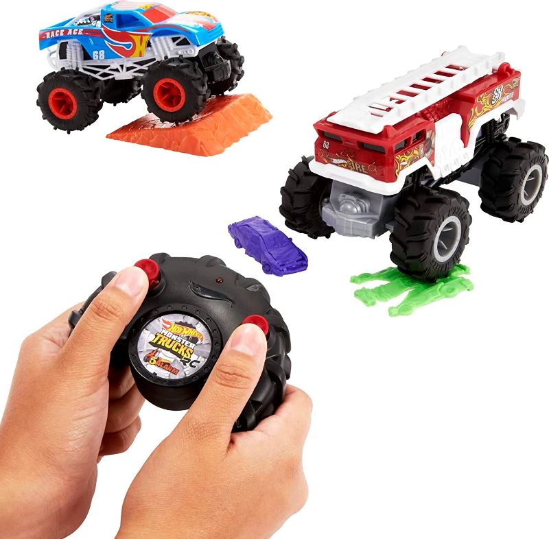 Photo 1 of Hot Wheels Monster Trucks 2-Pack, 1 Race Ace & 1 HW 5-Alarm in 1:24 Scale, Full-Function Remote-Control Toy for Kids 4 Years Old & Up [Amazon Exclusive]
