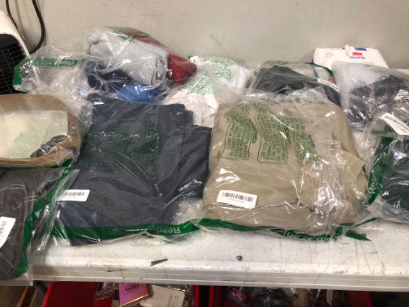 Photo 1 of Assorted Men Clothes Various Sizes Sold As is