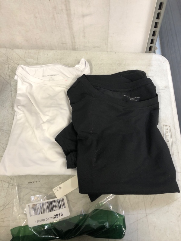 Photo 1 of Essentials Women's 2-Pack Tech Stretch Short-Sleeve Crewneck T-Shirt, -black/white, Large
, BLACK SHIRT HAS ASTAIN 
