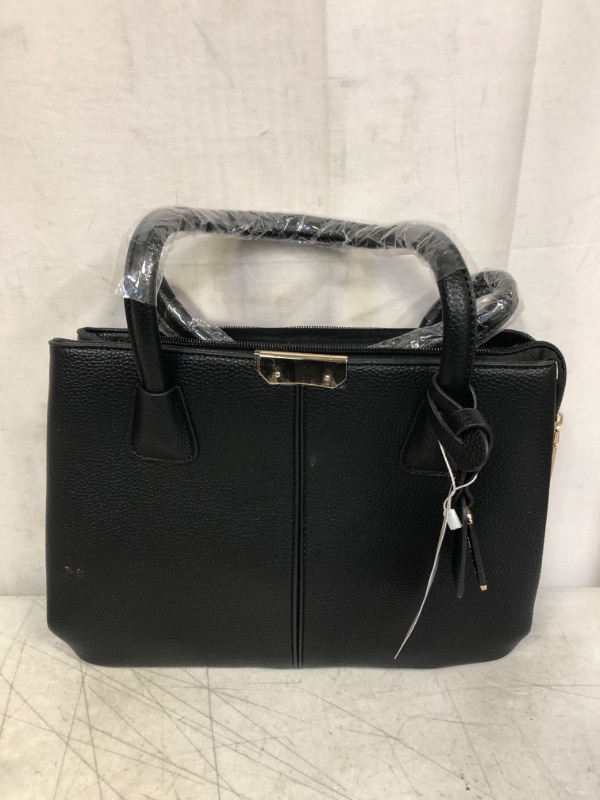 Photo 1 of BLACK HANDBAG TOTE (ITEM HAS STAINS)