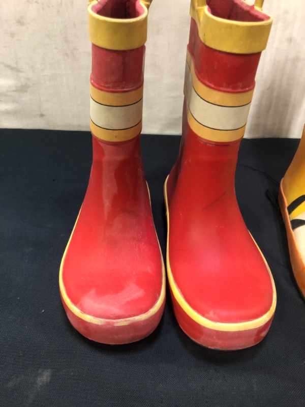 Photo 1 of 2 PIECE CHILDRENS RUBBER RAIN BOOTS (ORANGE BOOTS ARE SIZE 11) ( RED BOOTS ARE SIZE 10)