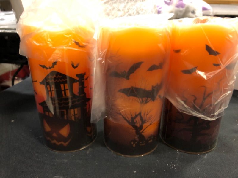 Photo 2 of 3 Pieces Halloween Flameless LED Candles Battery Operated Wax Candles Assorted Decals Flameless Candles with 6 Pieces Pumpkin Lamps Set for Halloween Decoration