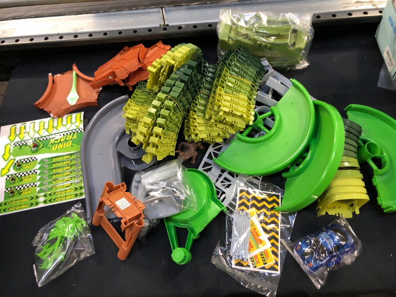 Photo 1 of Dinosaur Track Toy Set 280 PCS Flexible Race Track Playset with 240 Tracks 2 Race Cars 1 Ferris Wheel (360 Degree Rotation). 1 Rotary U-Turn Tower
