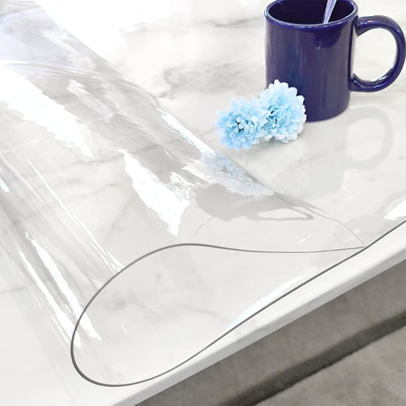 Photo 1 of Crystal Clear Desk Pad, Clear Desk Mat, 2.0mm Thick Plastic Desk Protector, Clear PVC Table Cover Protector, for Table Calendar, Desk Pad Mat for Office & Computer Desk 12 x 12 Inch