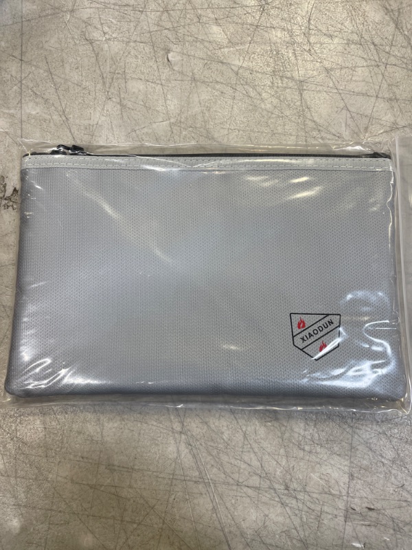 Photo 1 of XIAODUNFireproof Money Bag,Bank Bag Fireproof and Waterproof Cash Bag with Zipper Closure, Fireproof Safe Storage Bag Envelope, Suitable for documents, Bank Inventory, Passport… (Gray, M) Gray M