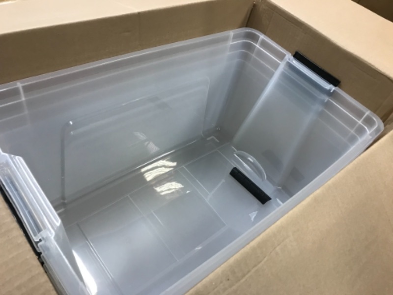 Photo 1 of IRIS USA 72 Qt. Plastic Storage Bin Tote Organizing Container with Durable Lid and Secure Latching Buckles, Stackable and Nestable, 4 Pack, clear with Black Buckle g) 72 Qt. - 4 Pack
