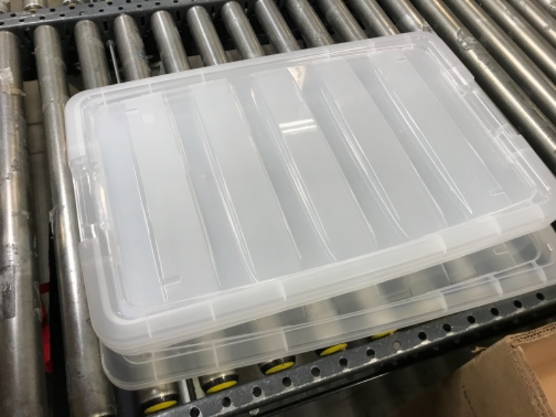 Photo 1 of IRIS USA 72 Qt. Plastic Storage Bin Tote Organizing Container with Durable Lid and Secure Latching Buckles, Stackable and Nestable, 4 Pack, clear with Black Buckle g) 72 Qt. - 4 Pack