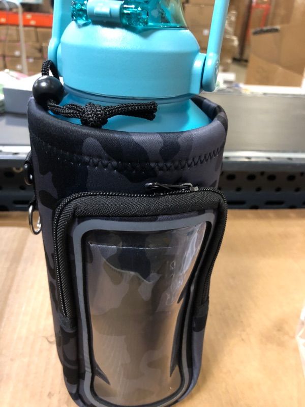 Photo 1 of Half Gallon Water Bottle with Sleeve 64 oz Water Bottle with Straw & Time Marker Insulated BPA Free Leakproof Sport Water Jugs for Drinking for School, Fitness, Gym and Outdoor Sports