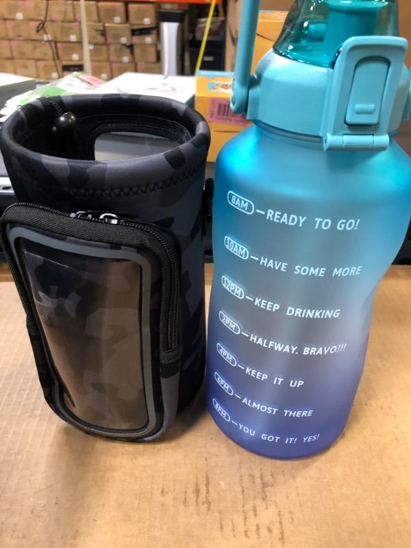 Photo 2 of Half Gallon Water Bottle with Sleeve 64 oz Water Bottle with Straw & Time Marker Insulated BPA Free Leakproof Sport Water Jugs for Drinking for School, Fitness, Gym and Outdoor Sports