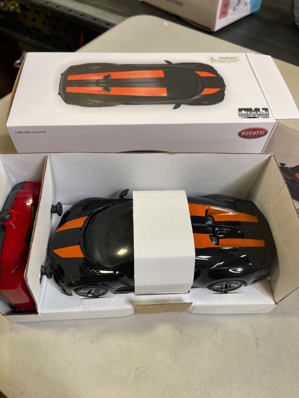 Photo 4 of CMJ RC Cars Bugatti Chiron RC Remote Control Car Supersport Black & Orange 2.4Ghz 1:24 Scale. Great Kids Play Toy Auto
