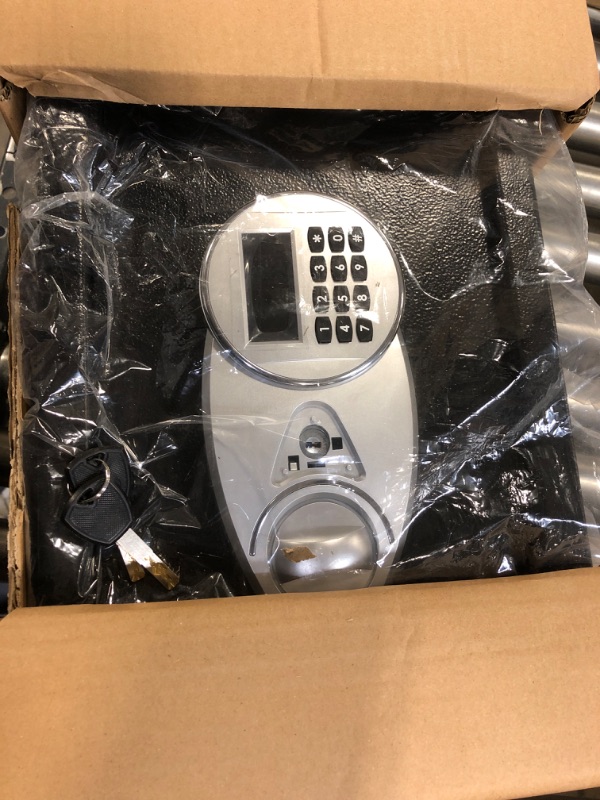 Photo 1 of AmazonBasics Security Safe - 0.5-Cubic Feet MISSING CAP ON THE FRONT.