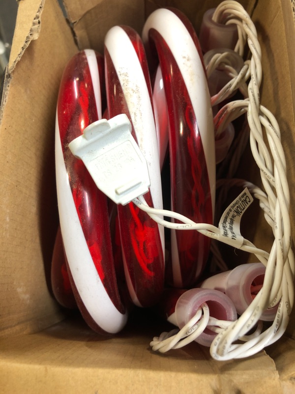 Photo 1 of 24.5" Candy Cane Lights with Stakes, 12 Packs Large Christmas Pathway Lights Outdoor, 8 Light Modes Candy Cane Pathway Markers Christmas Decorations for Yard Patio Garden Walkway Sidewalks UNABLE TO CHECK FOR FUNCTIONALITY.