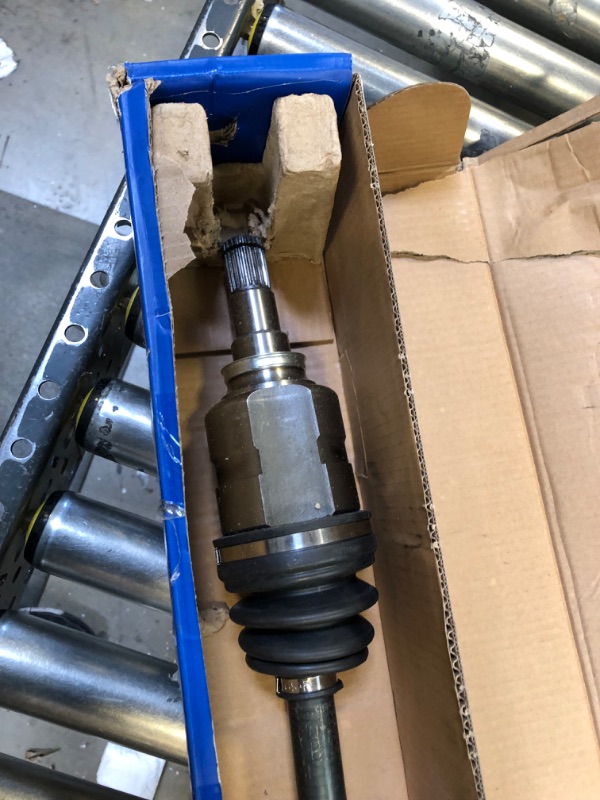 Photo 5 of GSP NCV69584 CV Axle Shaft Assembly - Right Front (Passenger Side), black, 39.4 inch-------item has rust stains due to usage 