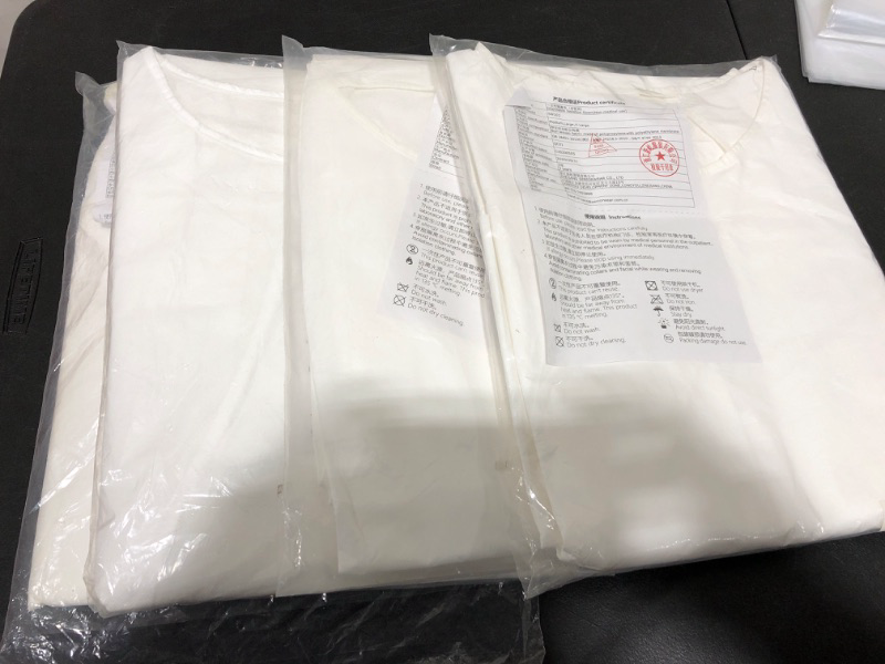 Photo 2 of 4 Packs of Disposable Isolation Gowns - XL