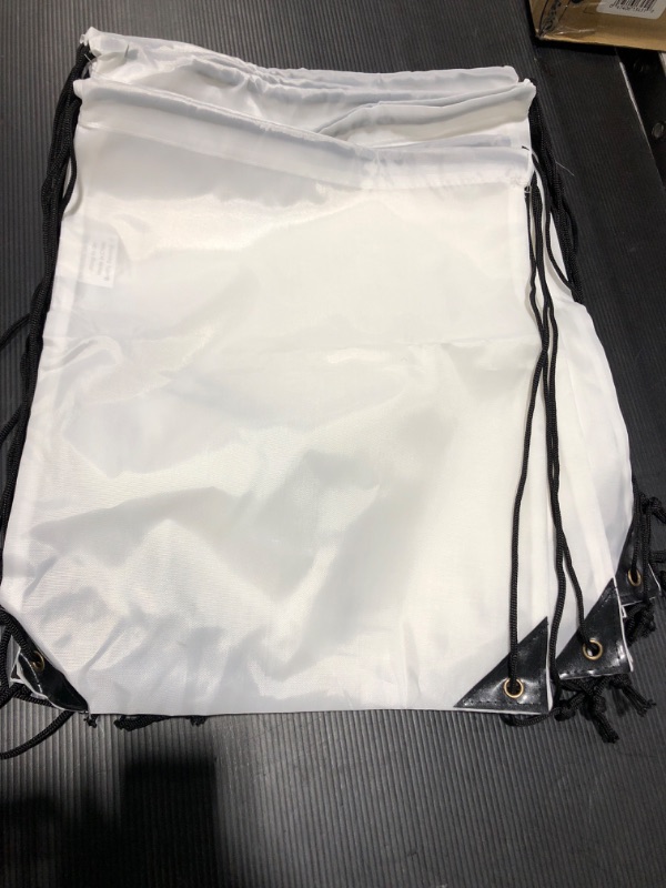 Photo 1 of 19 Black String White Backpack