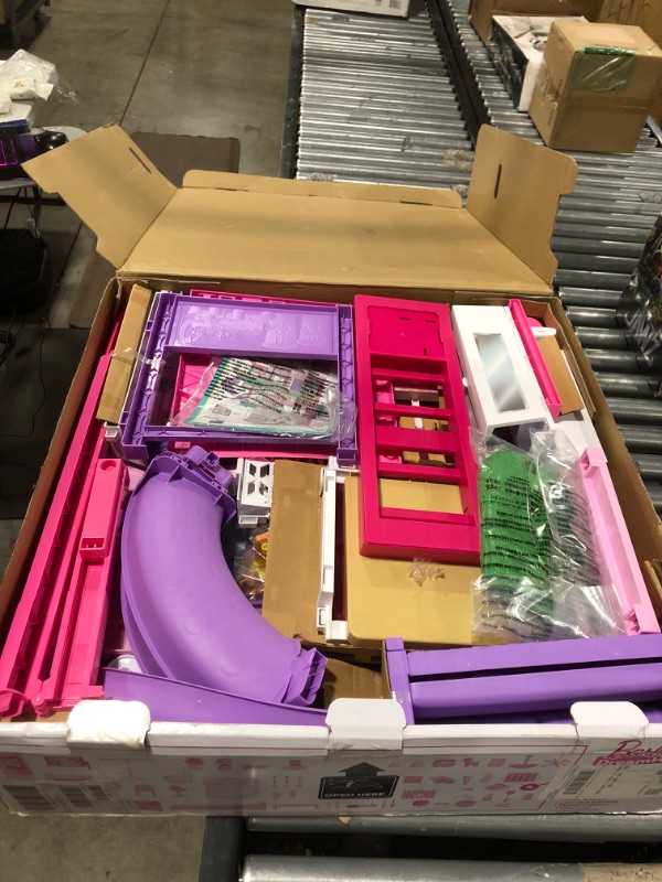 Photo 1 of Barbie Dreamhouse Dollhouse with Wheelchair Accessible Elevator, Pool, Slide and 70 Accessories Including Furniture and Household Items, Gift for 3 to 7 Year Olds