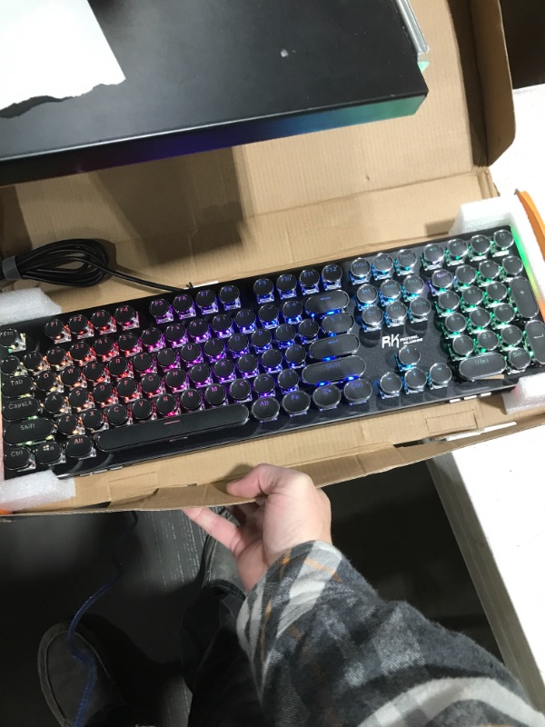 Photo 1 of RK ROYAL KLUDGE Typewriter Style Mechanical Gaming Keyboard with True RGB Backlit Collapsible Wrist Rest 108-Key Blue Switch Retro Round Keycap - Black