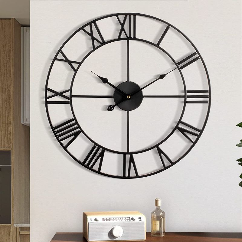 Photo 1 of 1st owned Large Wall Clock Metal Retro Roman Numeral Clock, Modern Round Wall Clocks Almost Silent , Easy to Read for Living Room/Home/Kitchen/Bedroom/Office/School Decor (Black, 24 Inch)

