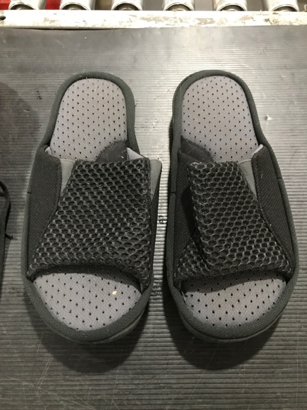 Photo 1 of 2 pack 1 black large slippers and 1 size 7 black water shoes
