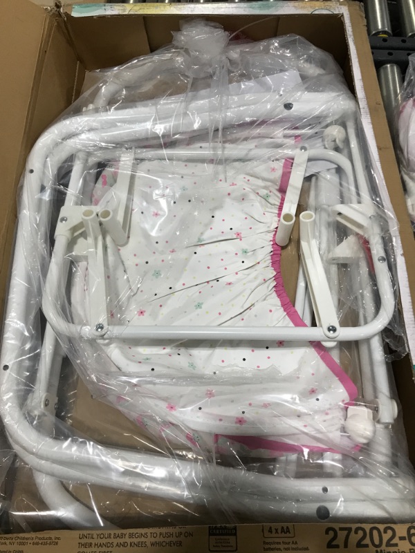Photo 1 of Delta Children Gliding Bedside Bassinet - Portable Crib with Lights, Sounds and Vibration, Disney Minnie Mouse Boutique Disney Minnie Mouse Boutique Bassinet