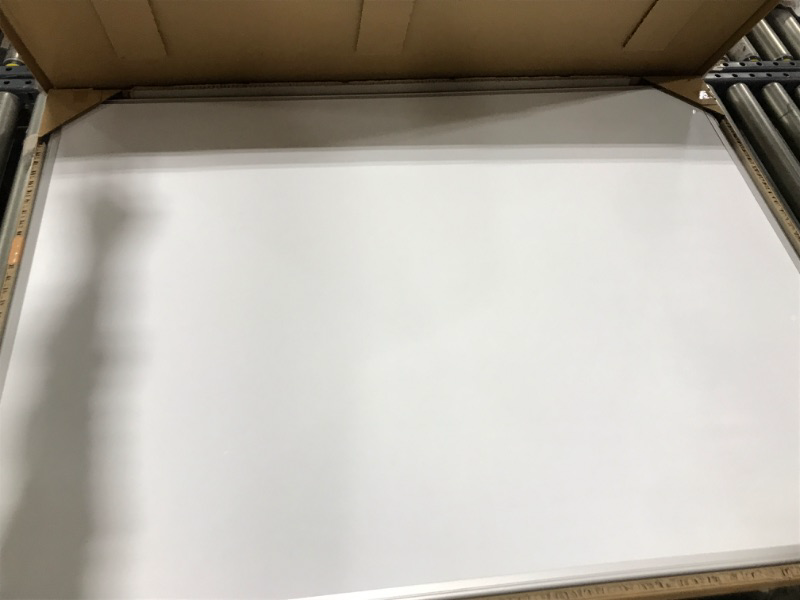 Photo 1 of Amazon Basics Magnetic Dry Erase White Board, 35 x 47-Inch Whiteboard - Silver Aluminum Frame 35" x 47" Magnetic, Aluminum Frame