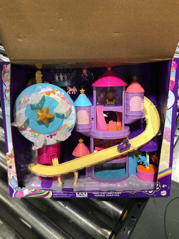 Photo 2 of ?Polly Pocket Rainbow Funland Theme Park, 3 Rides, 7 Play Areas, Polly and Shani Dolls, 2 Unicorns & 25 Surprise Accessories (30 Total Play Pieces), Dispensing Feature for Surprises