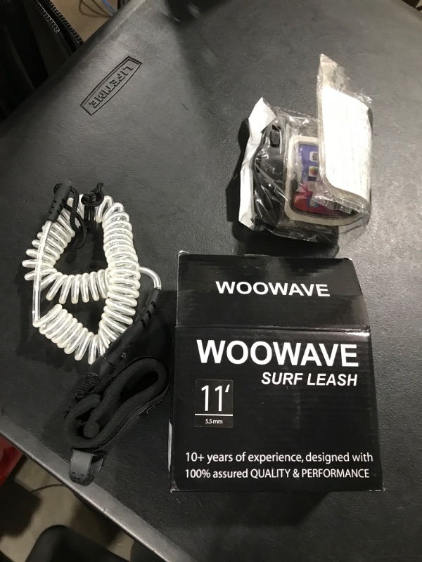 Photo 2 of WOOWAVE SUP Leash 11 Foot Coiled Stand Up Paddle Board Surfboard Leash Stay on Board Ankle Strap with Waterproof Wallet/Phone Case
