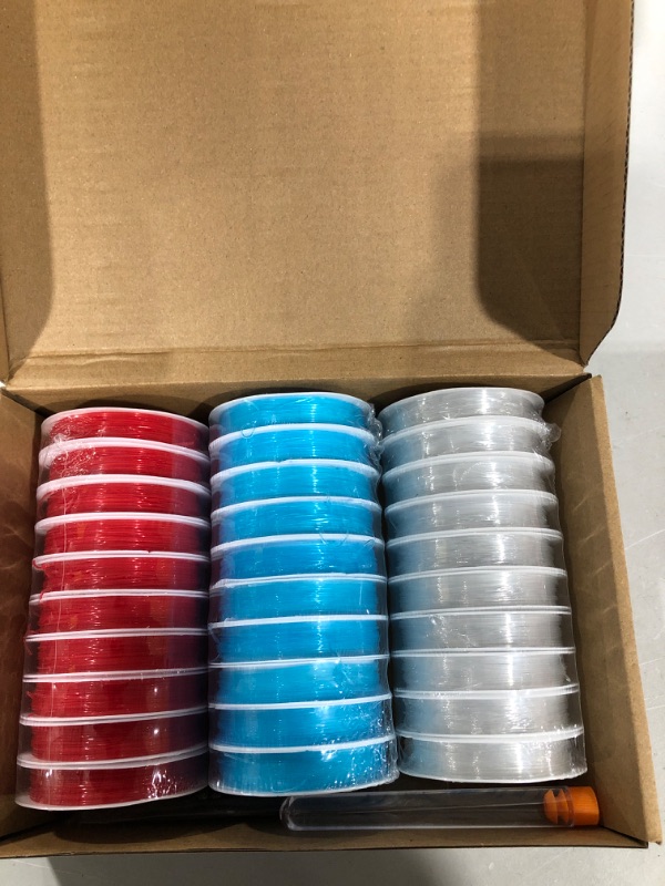Photo 1 of 30 Rolls 0.8 mm Elastic String for Bracelets Elastic Cord for Jewelry Making Stretchy Blue Red Clear Thread for Bracelet Making Beading Stretch Rope with Needle Scissors for Necklace (8 Meters/ Roll)