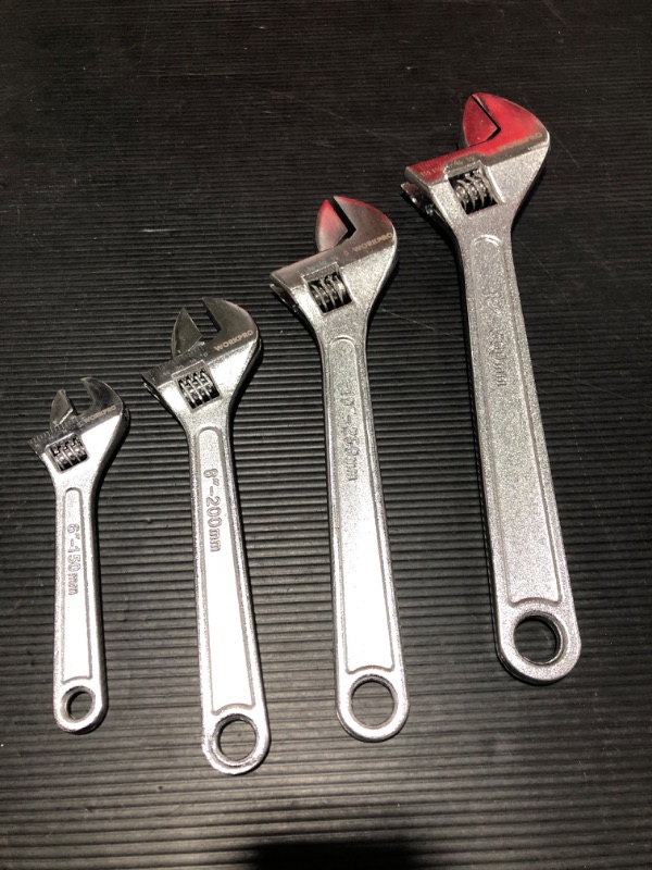 Photo 1 of 4 DIFFERENT SIZED WRENCHES