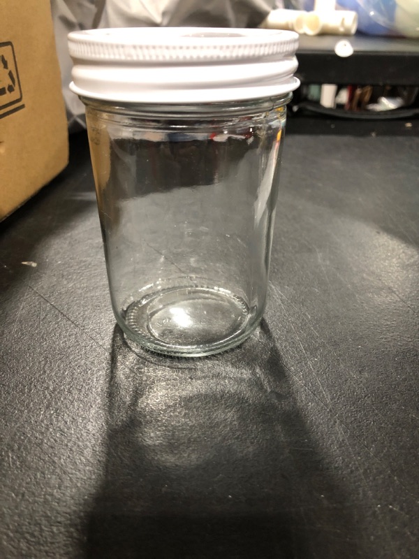 Photo 1 of 4" SMALL GLASS STORAGE JARS WITH WHITE LID (12PK) 