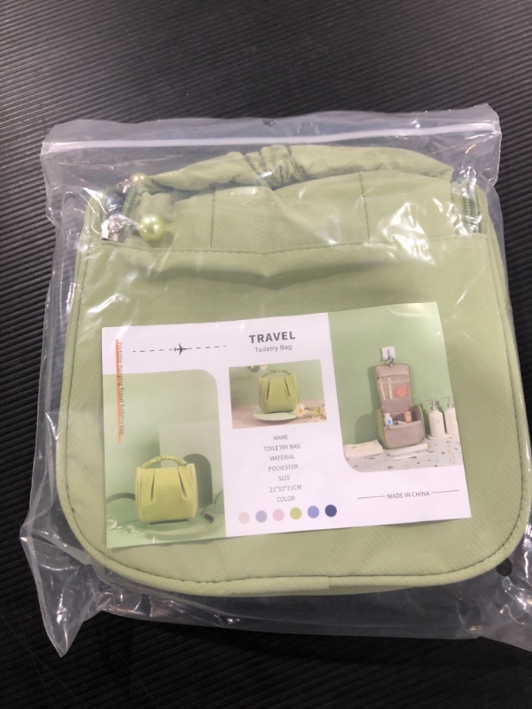 Photo 1 of AKEISI Toiletry Bag, Travel Makeup Organizer, Large Cosmetic Bags with Hanging Hook for Accessories, Shampoo, Full Sized Container, Toiletries(Green)
