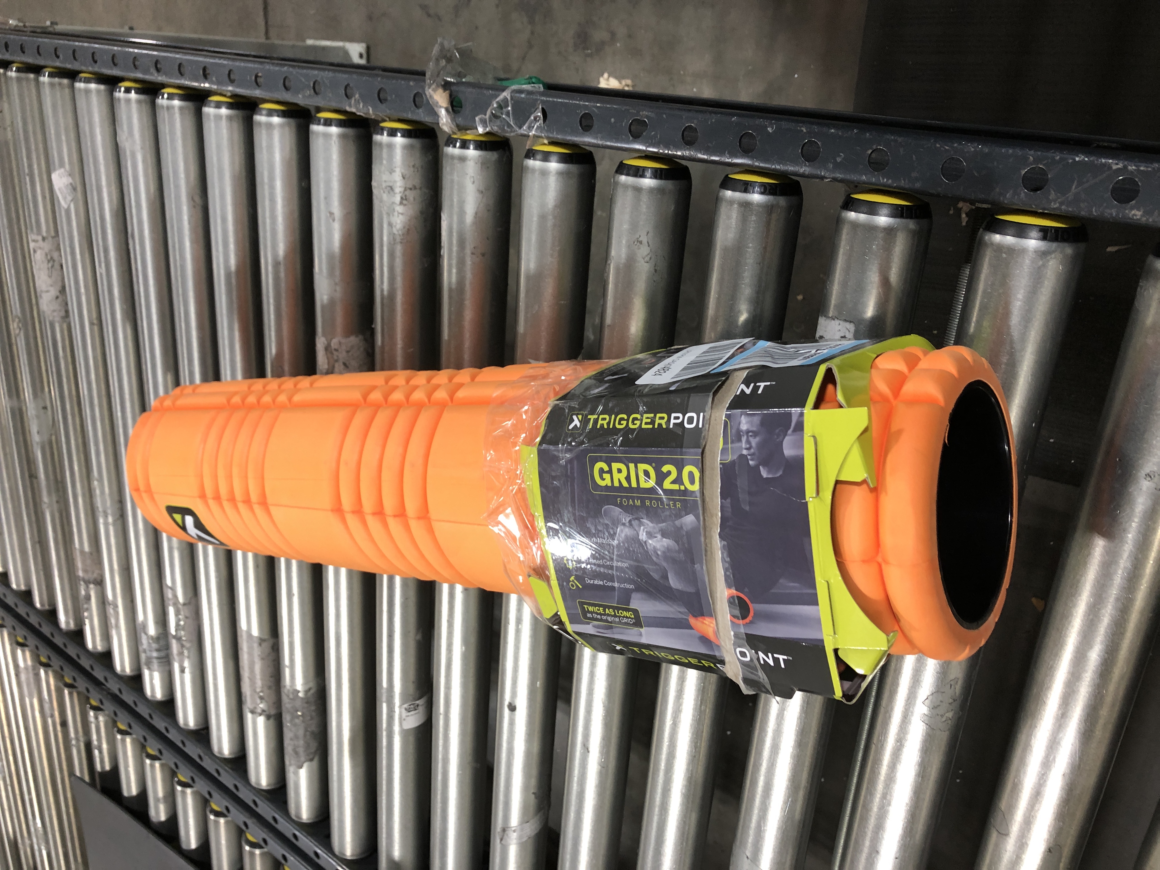 Photo 1 of TriggerPoint GRID Patented Multi-Density Foam Massage Roller (Back, Body, Legs) for Exercise, Deep Tissue and Muscle Recovery - Relieves Muscle Pain & Tightness, Improves Mobility & Circulation (26") Orange