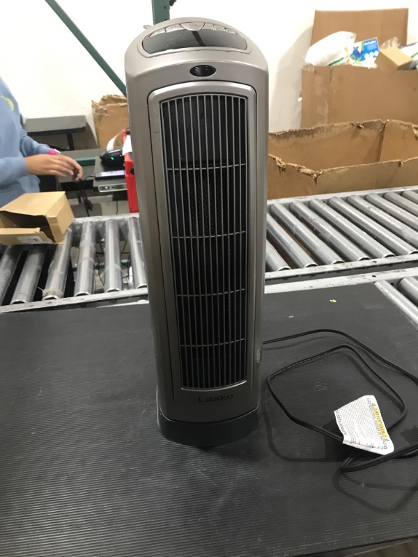 Photo 1 of Lasko Oscillating Digital Ceramic Tower Heater for Home with Adjustable Thermostat, Timer and Remote Control, 23 Inches, 1500W, Silver, 755320