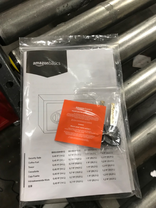 Photo 1 of Amazon Basics Steel Security Safe with Programmable Electronic Keypad - Secure Cash, Jewelry, ID Documents - 0.7 Cubic Feet, 16.93 x 14.57 x 7.09 Inches 0.7 Cubic Feet Keypad Lock