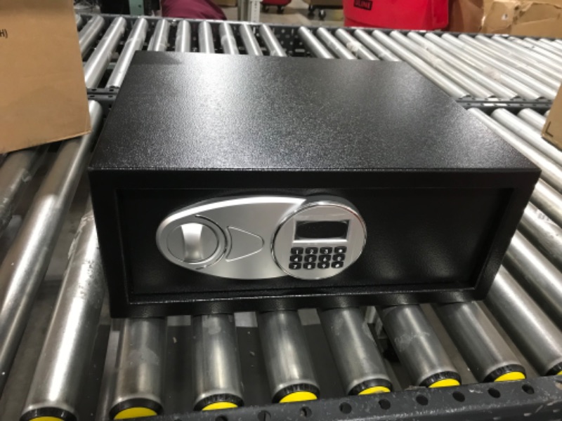 Photo 1 of Amazon Basics Steel Security Safe with Programmable Electronic Keypad - Secure Cash, Jewelry, ID Documents - 0.7 Cubic Feet, 16.93 x 14.57 x 7.09 Inches 0.7 Cubic Feet Keypad Lock