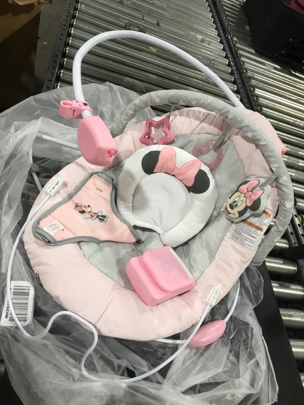 Photo 1 of Bright Starts Minnie Mouse Rosy Skies Baby Bouncer with Vibrating Infant Seat, Music & 3 Playtime Toys, 23x19x23 Inch (Pink)