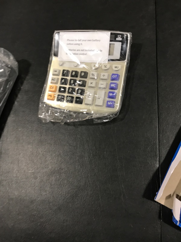 Photo 1 of Calculator 