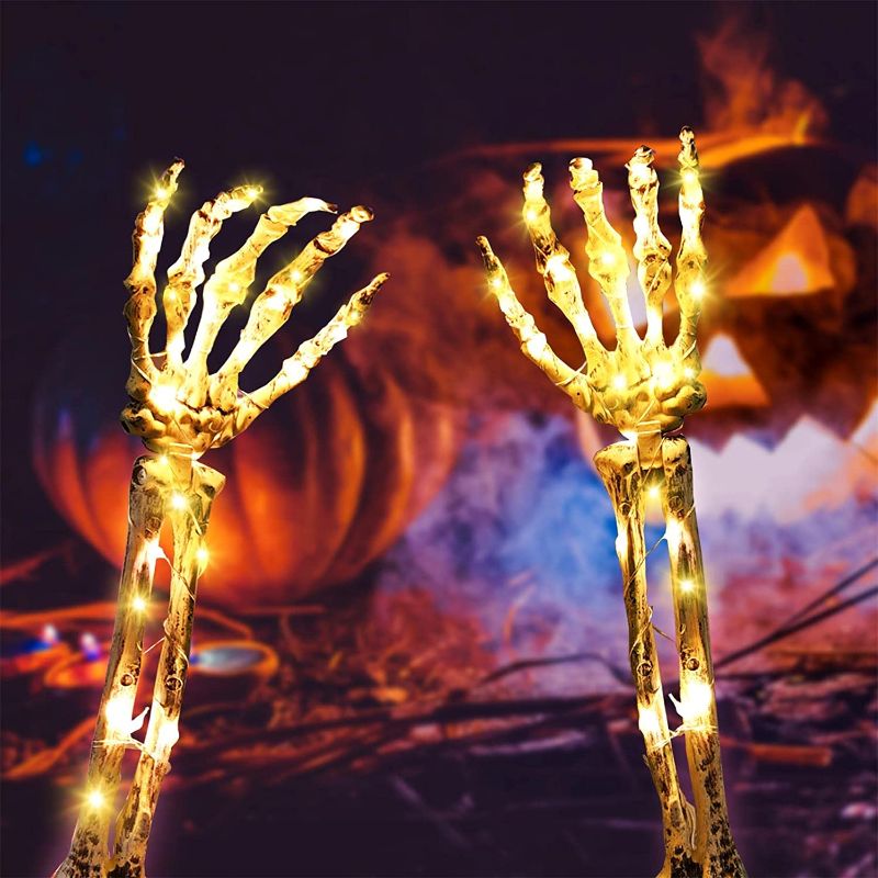 Photo 1 of AMARS Scary Halloween Skeleton Decorations, 2 Pack Graveyard Lighted Halloween Skeleton Arm Stakes with Timer, Battery Operated Waterproof 40 LED Light Up Halloween Decorations for Outdoor Indoor Yard 